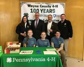 2019 Wayne County Ag Day, Wayne County 4-H Science of Ag Team with PA state and local officials at the 2019 Wayne County Ag Day: PA Sen. Lisa Baker, back left, PA Secretary of Agriculture Russell Reading, Wayne County Commissioner Brian Smith, former Wayne County Commissioner Wendall Kay, Paige Gries, front left, Clara Murphy and Eoghan Murphy.